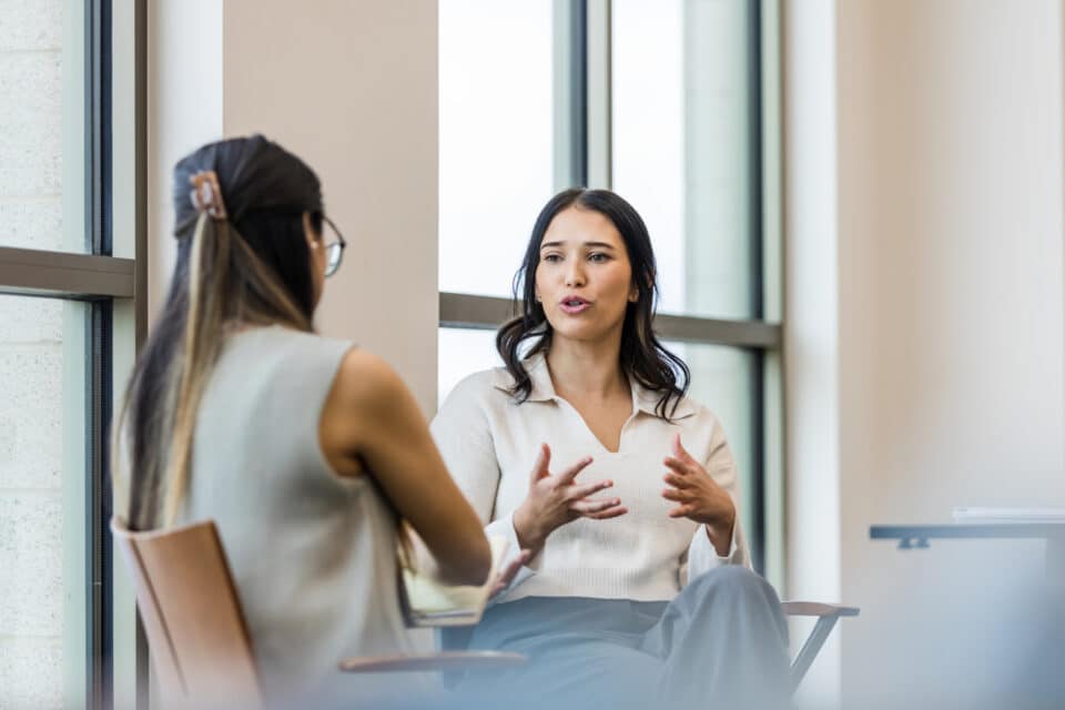 Two women having a conversation